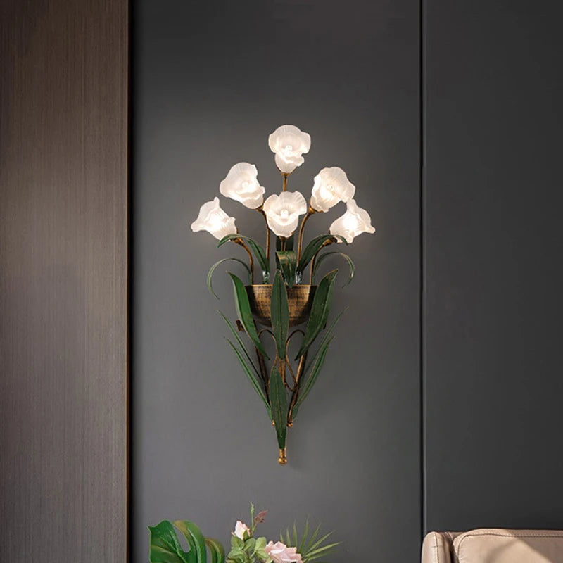 White floral French country wall lamp mounted in a modern living room, blending vintage charm with elegant lighting design.