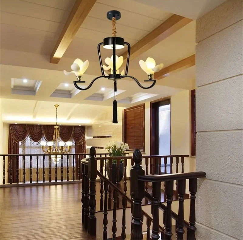 Black Magnolia Flower Pendant Light with 3 LED floral bulbs, retro ceiling lamp for stairway or hallway lighting.