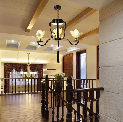 Black Magnolia Flower Pendant Light with 3 LED floral bulbs, retro ceiling lamp for stairway or hallway lighting.