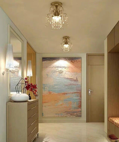 Luxury gold crystal ceiling lights installed in a modern hallway, showcasing vintage chandelier design for elegant interiors.