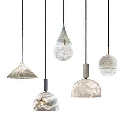 Assorted marble LED pendant lights in various shapes and sizes. Marble LED pendant light – modern ceiling lamp dimmable for stylish interiors.