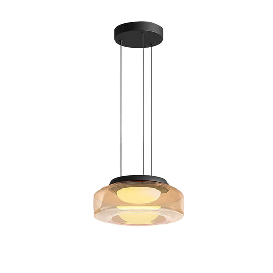 Glass pendant light in amber with LED source, ideal for luxury kitchen or dining room decor. Features a single-tier round design with dimmable lighting.