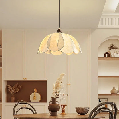 Modern Art Hanging Lamp with soft petal-shaped cloth shade, a Nordic pendant light ideal for warm dining room lighting.
