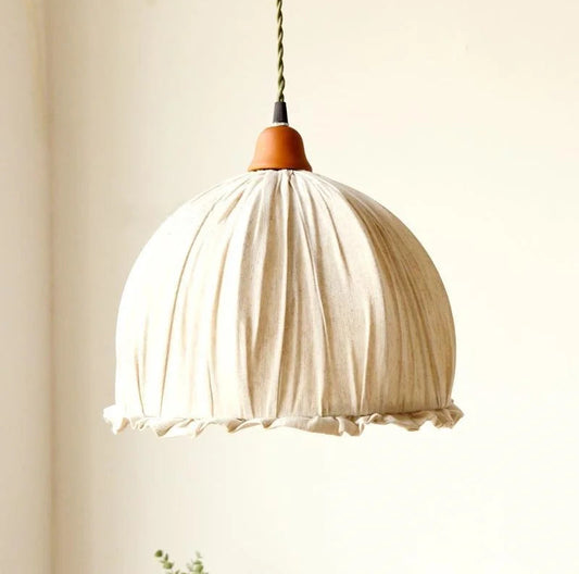 Nordic Japanese Fabric Pendant Lamp with pleated beige shade and wooden top, ideal for minimalist bedroom or dining room lighting.