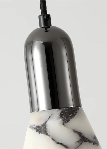 Dark Marble LED Pendant - Modern Ceiling Light detail of glossy black fixture and marble shade, showcasing high-quality craftsmanship.