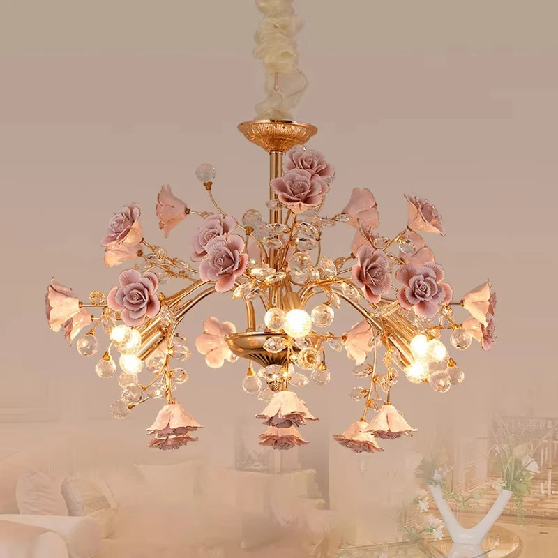 Elegant LED Rose Crystal Chandelier with cascading floral details and soft lighting, ideal for modern home interiors and cozy spaces.