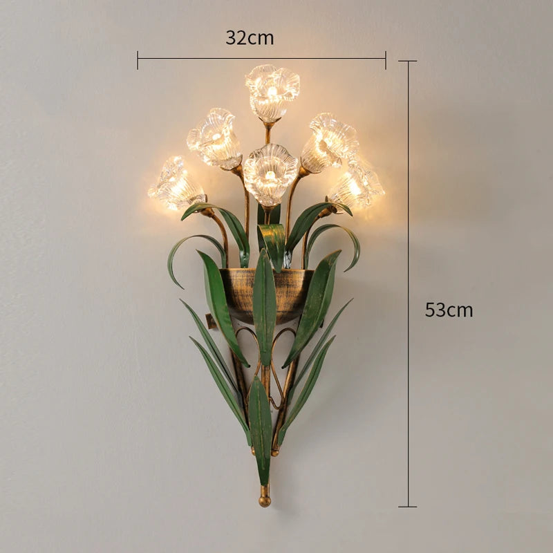Dimensions of vintage French wall sconce with white flower bulbs and green leaves, measuring 32cm wide and 53cm tall.