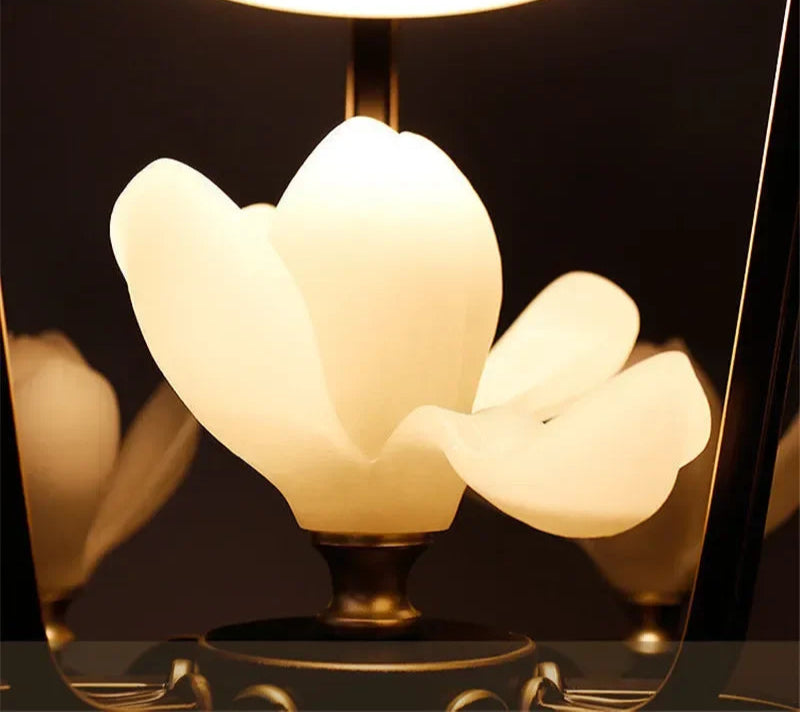 Detail of Magnolia Flower Pendant Light showing frosted resin flower-shaped LED bulb for soft, ambient lighting.