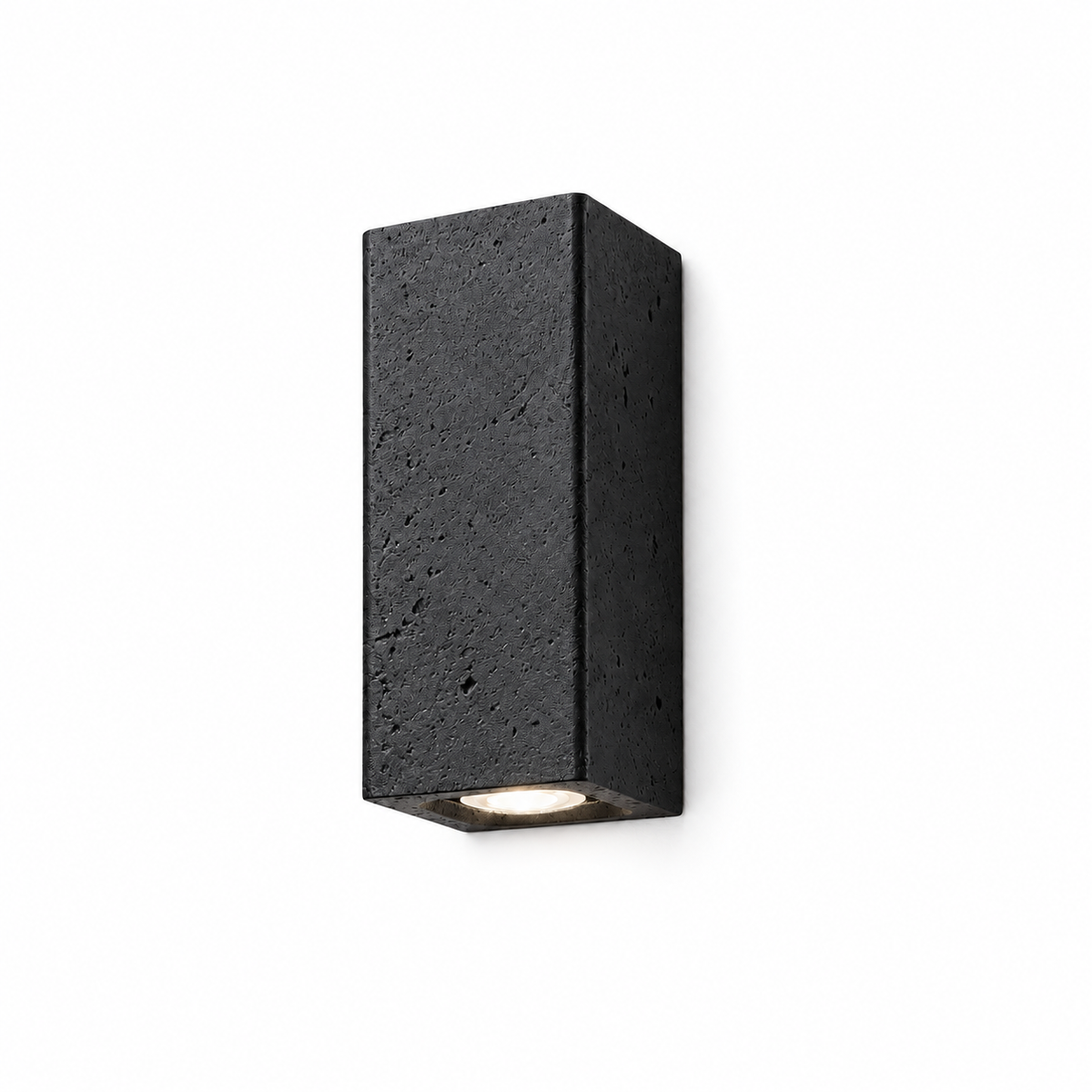 Black stone up-down wall light on a pure white background