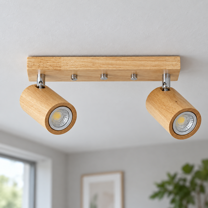Natural wood 2-light adjustable ceiling bar, 30 cm, installed in a contemporary interior