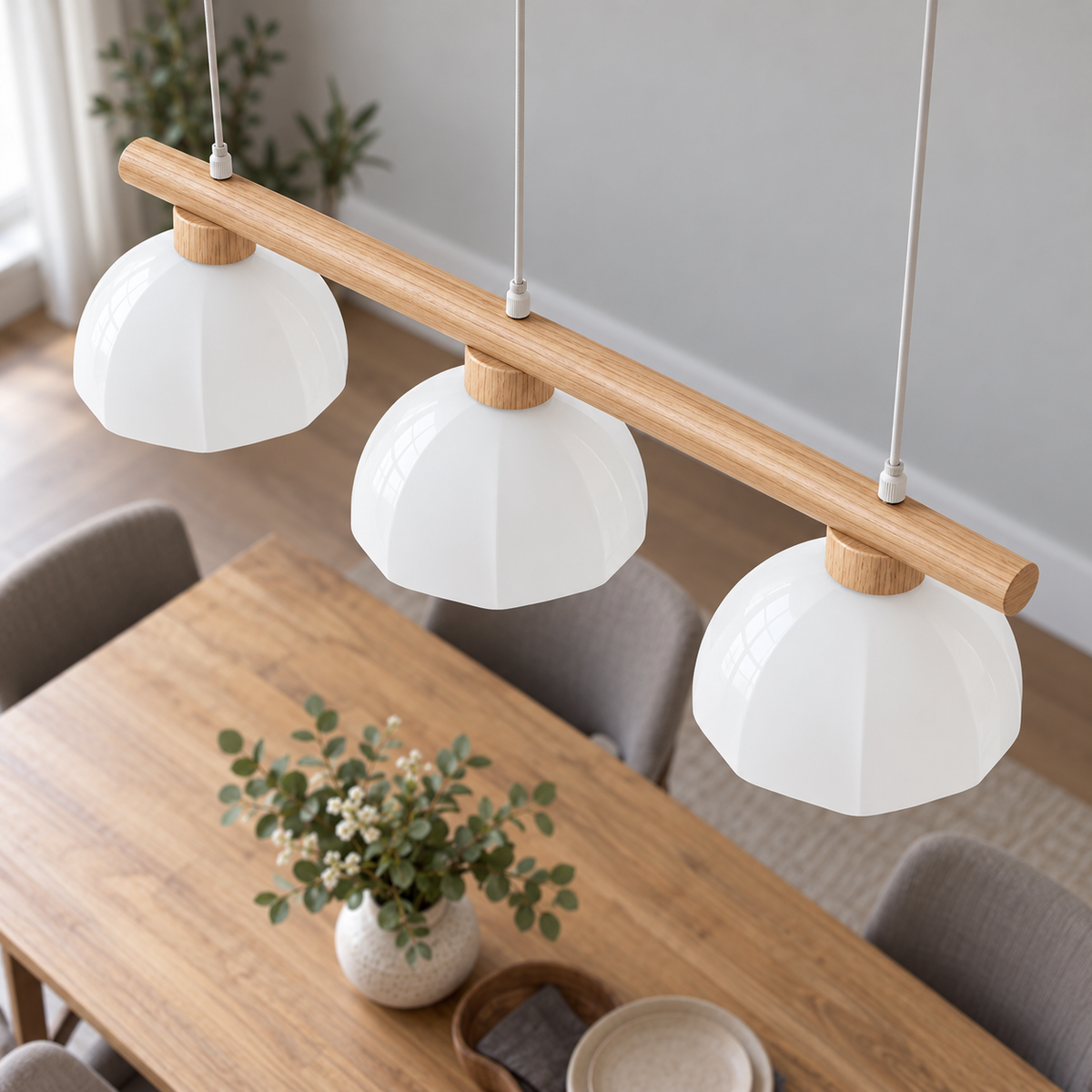 Elevated shade detail of the three-dome wood pendant, showing upper glass surfaces and the round wooden bar