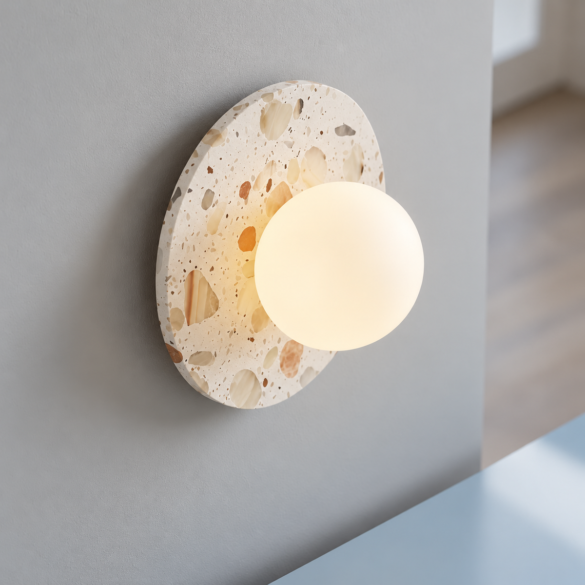 Terrazzo disc wall light with a frosted glass globe — above mid, White