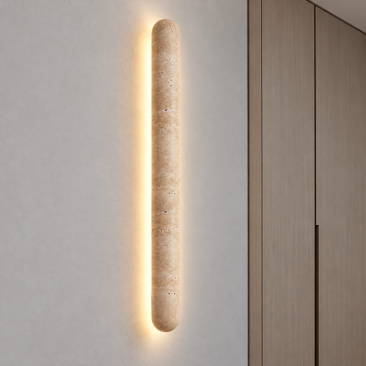 Capsule travertine wall light with a soft halo — commercial, Yellow-beige / Length 90 cm