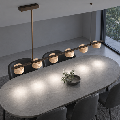 Natural stone pendant with six cylindrical shades — Six stone shades, opposite end upper view, illuminated