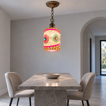 Beaded mosaic glass cylinder pendant on a chain — Style A, installed front view, illuminated