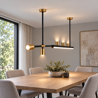 Offset island pendant with five directional spotlights — Black and gold 120 cm, complete installed commercial end view, illuminated.