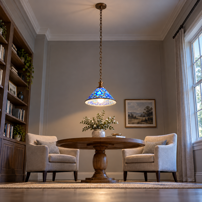 Geometric mosaic glass pendant with a wide cone shade — Style A, distant underside room view, illuminated.
