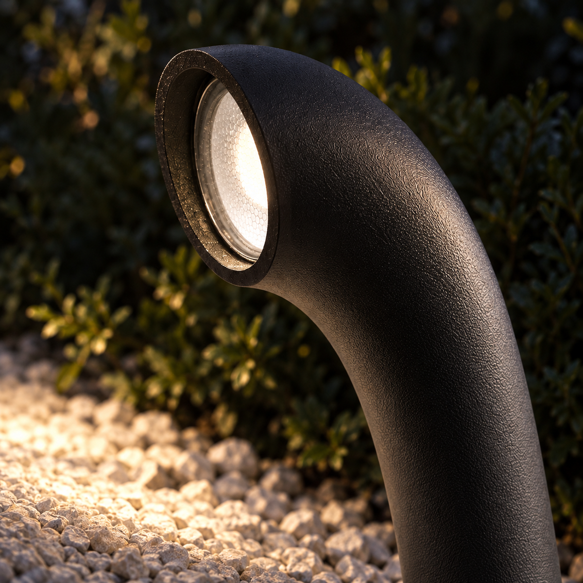 Curved aluminium path light with a downward glow — Black - Round base, edge on optic macro attempt1, illuminated