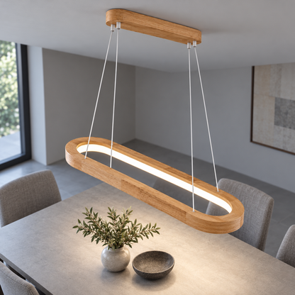 Illuminated 90cm light-wood oval pendant in a centered elevated commercial view