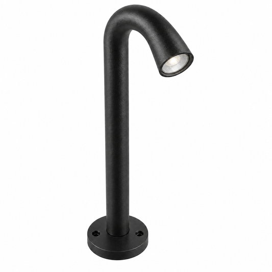 Black curved aluminium path light, complete round-base fixture illuminated, high opposite-side view on white