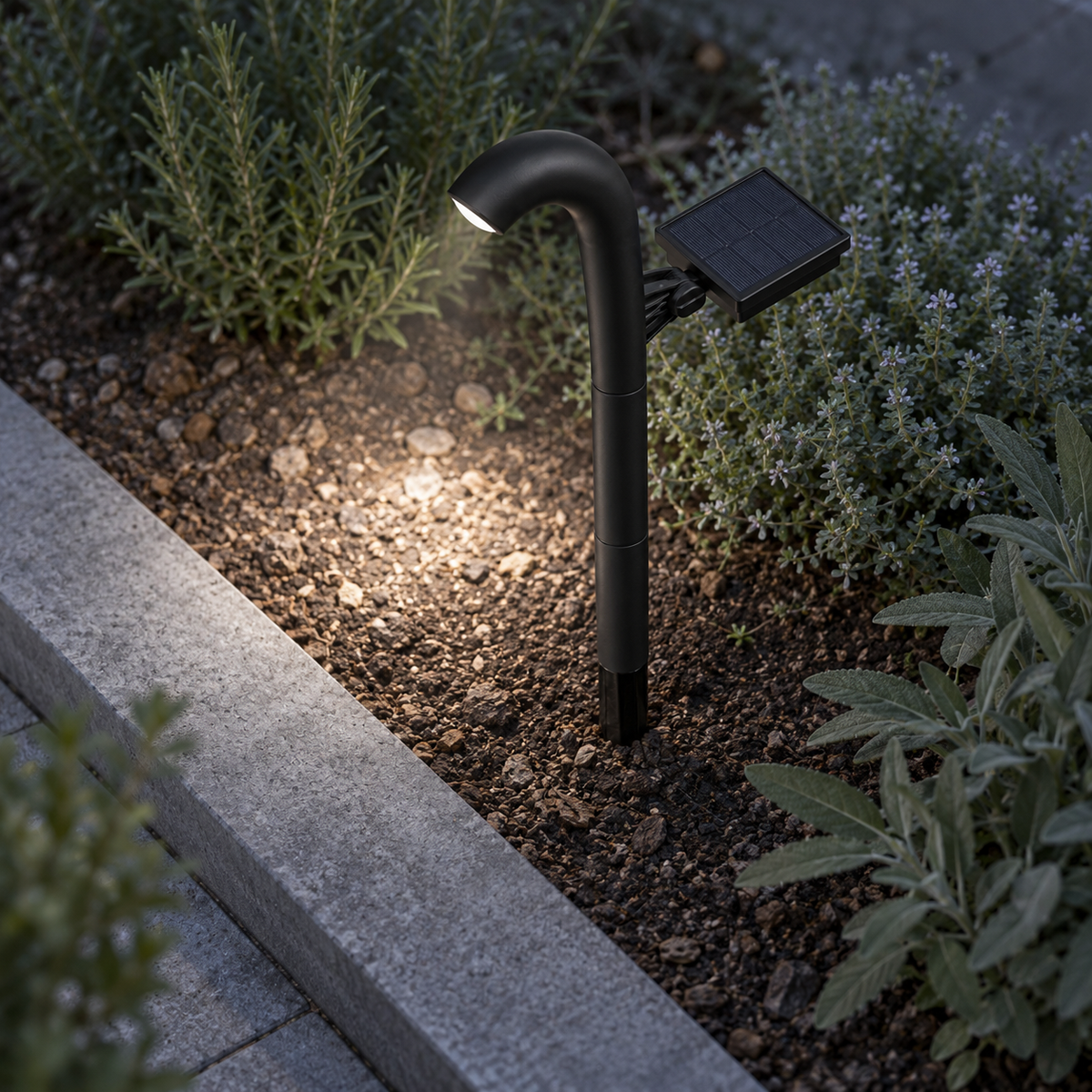 Steep above view of an installed arched solar path light with panel and visible light pool
