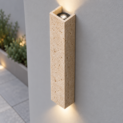 60 cm travertine wall light illuminated, complete installed body viewed from above left