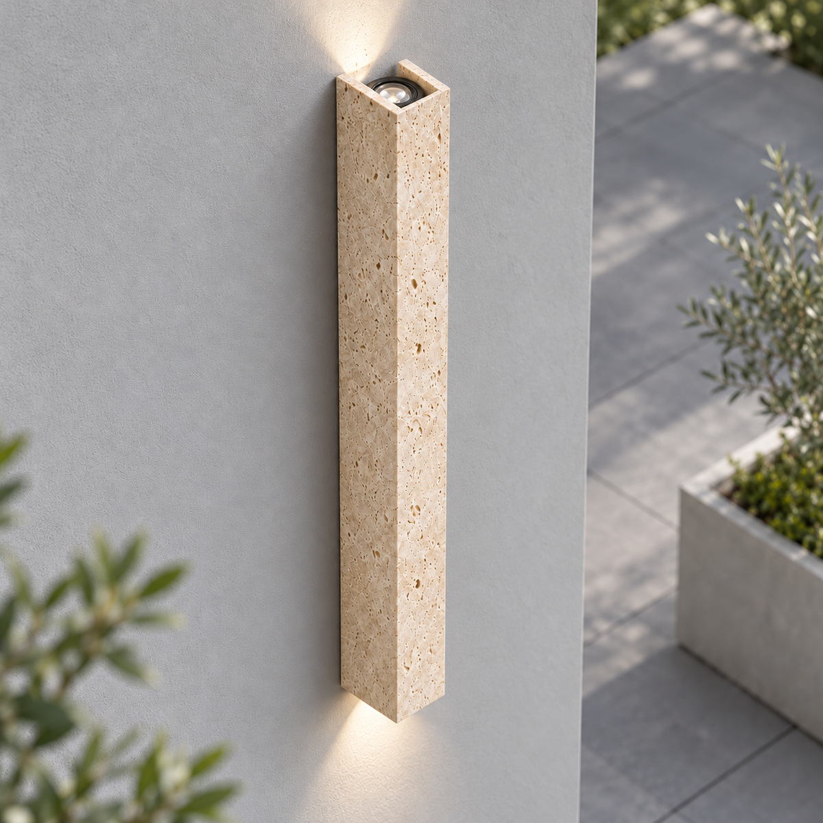 Tall travertine twin-beam wall light, 80 cm variant illuminated from elevated side