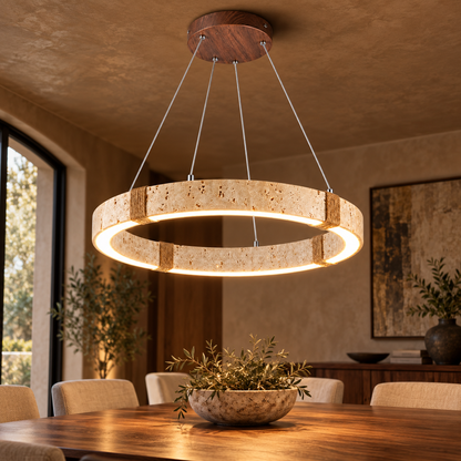 40 cm travertine ring pendant with dark wood-grain canopy installed in a contemporary interior