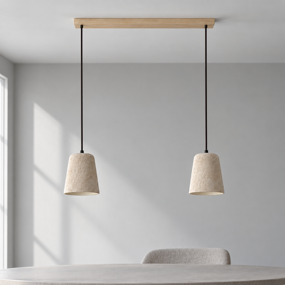Two travertine pendant shades with Beige wood ceiling canopy in a daylight interior