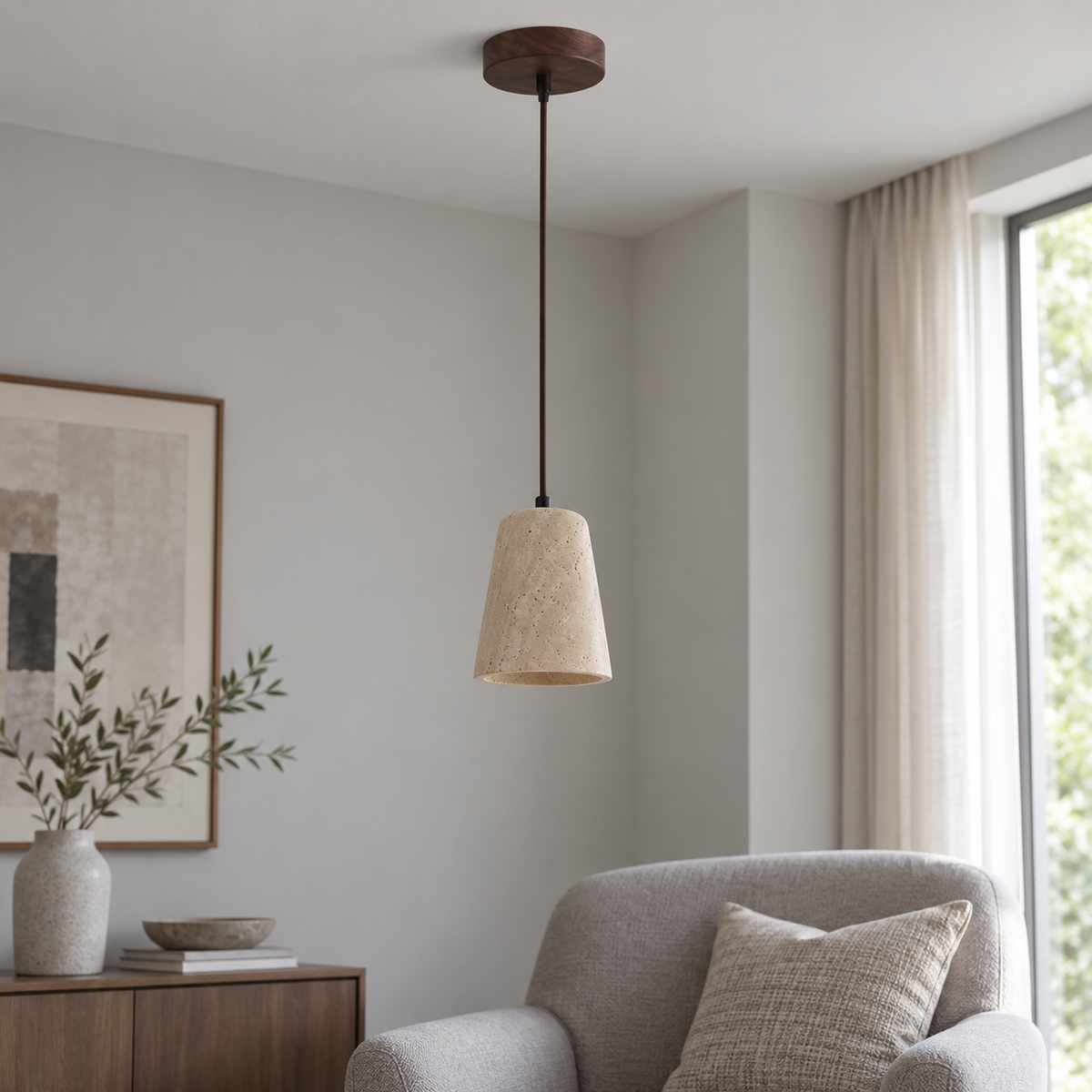 Single travertine pendant with walnut wood ceiling canopy, installed in a neutral daylight living room