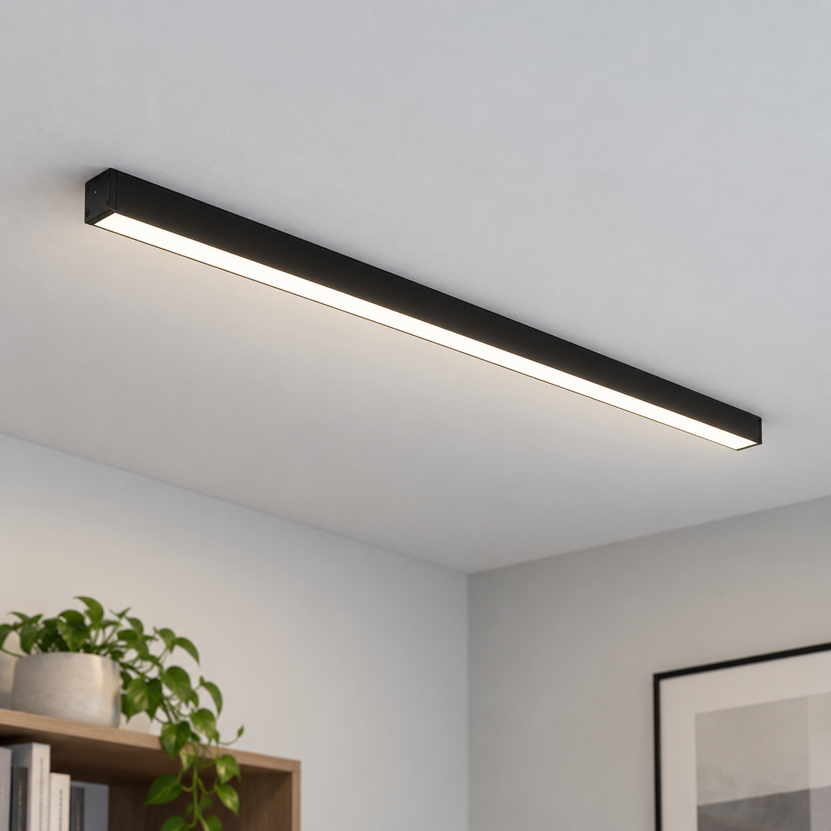 Black 60 cm aluminium ceiling bar installed flush in a neutral daylight room