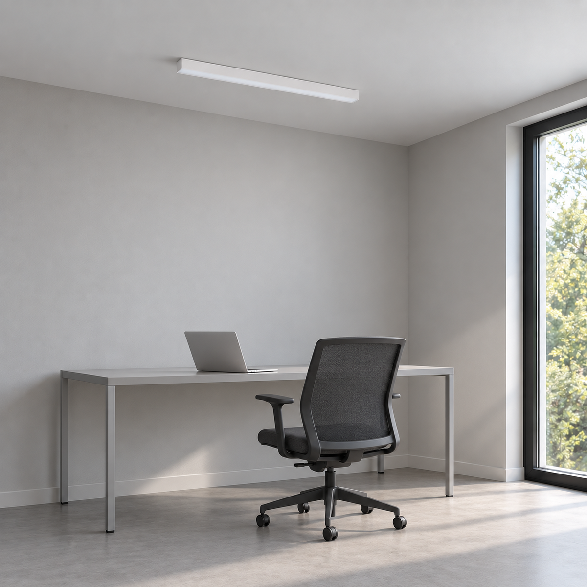 White 50 cm aluminium ceiling bar above a gray metal desk in a neutral daylight office