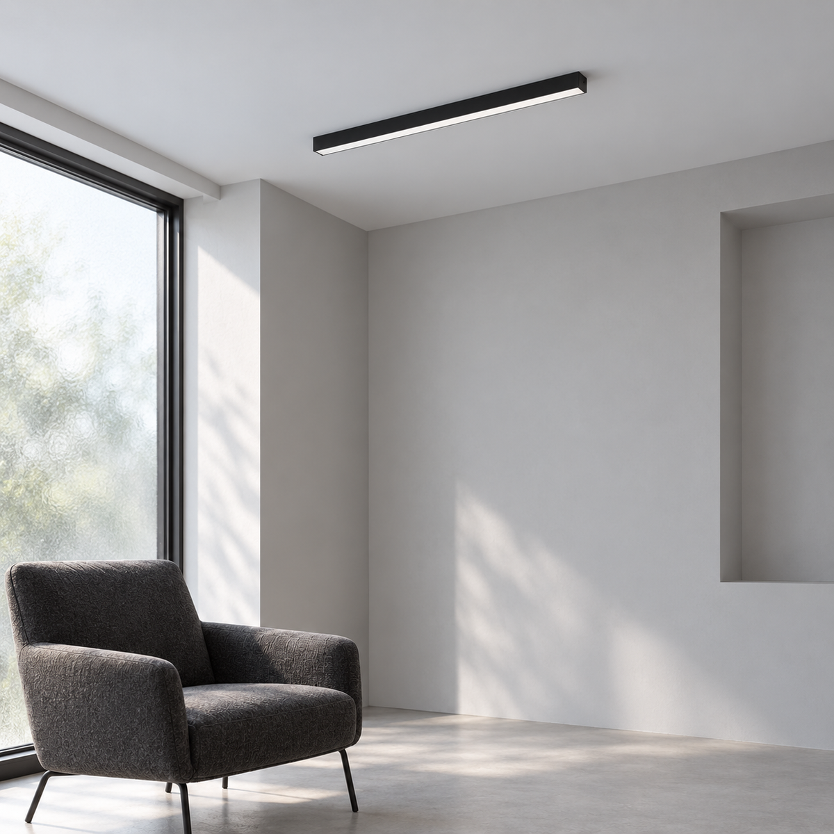 Black 50 cm aluminium ceiling bar in a simple neutral daylight reading corner
