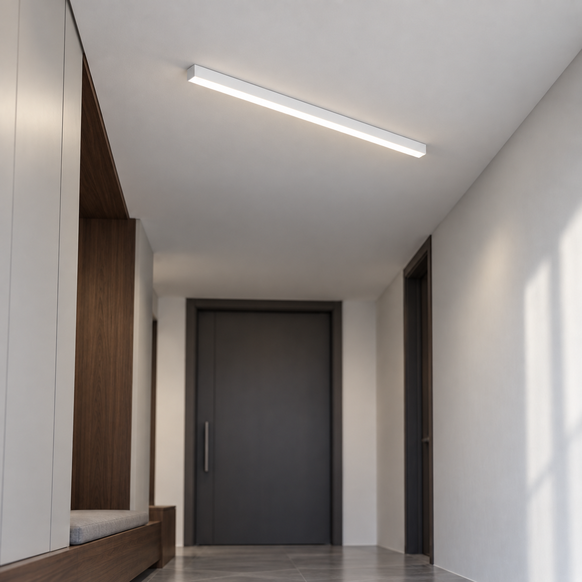 White 60 cm aluminium ceiling bar viewed from below in a neutral daylight hallway