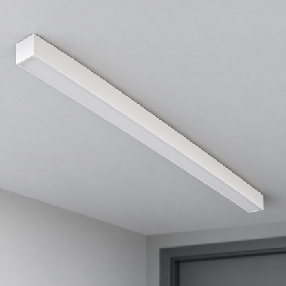 White 50 cm aluminium ceiling bar with unlit diffuser installed flush against a pale gray ceiling