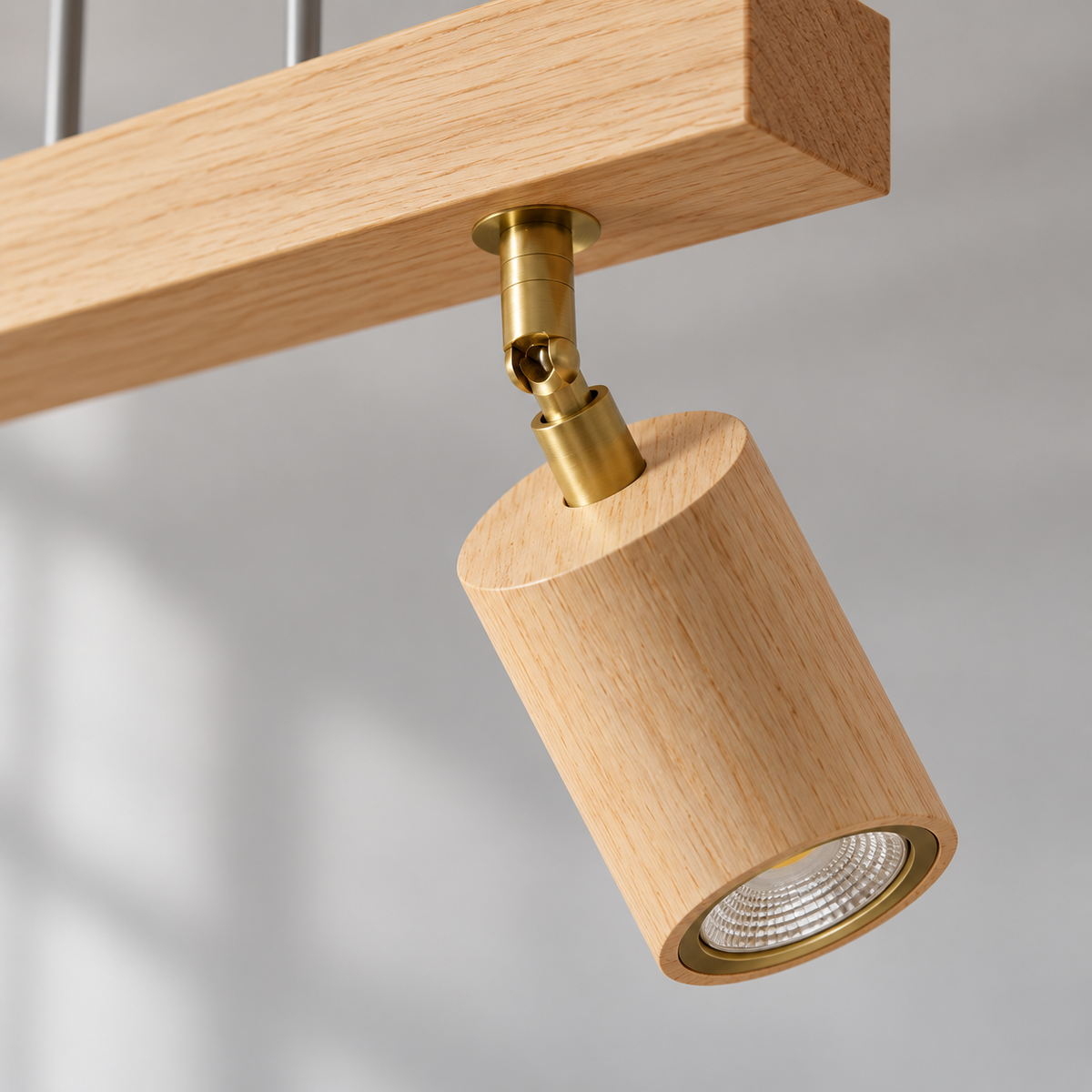 Beige wood pendant with 4 pivoting spotlights — detail closeup