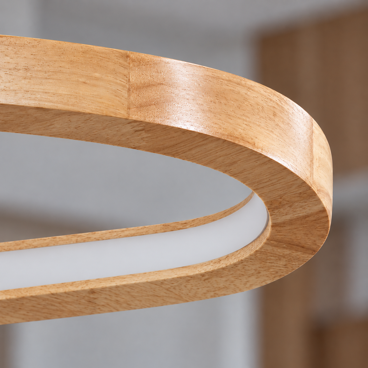 Solid wood oval pendant with an open centre — detail close