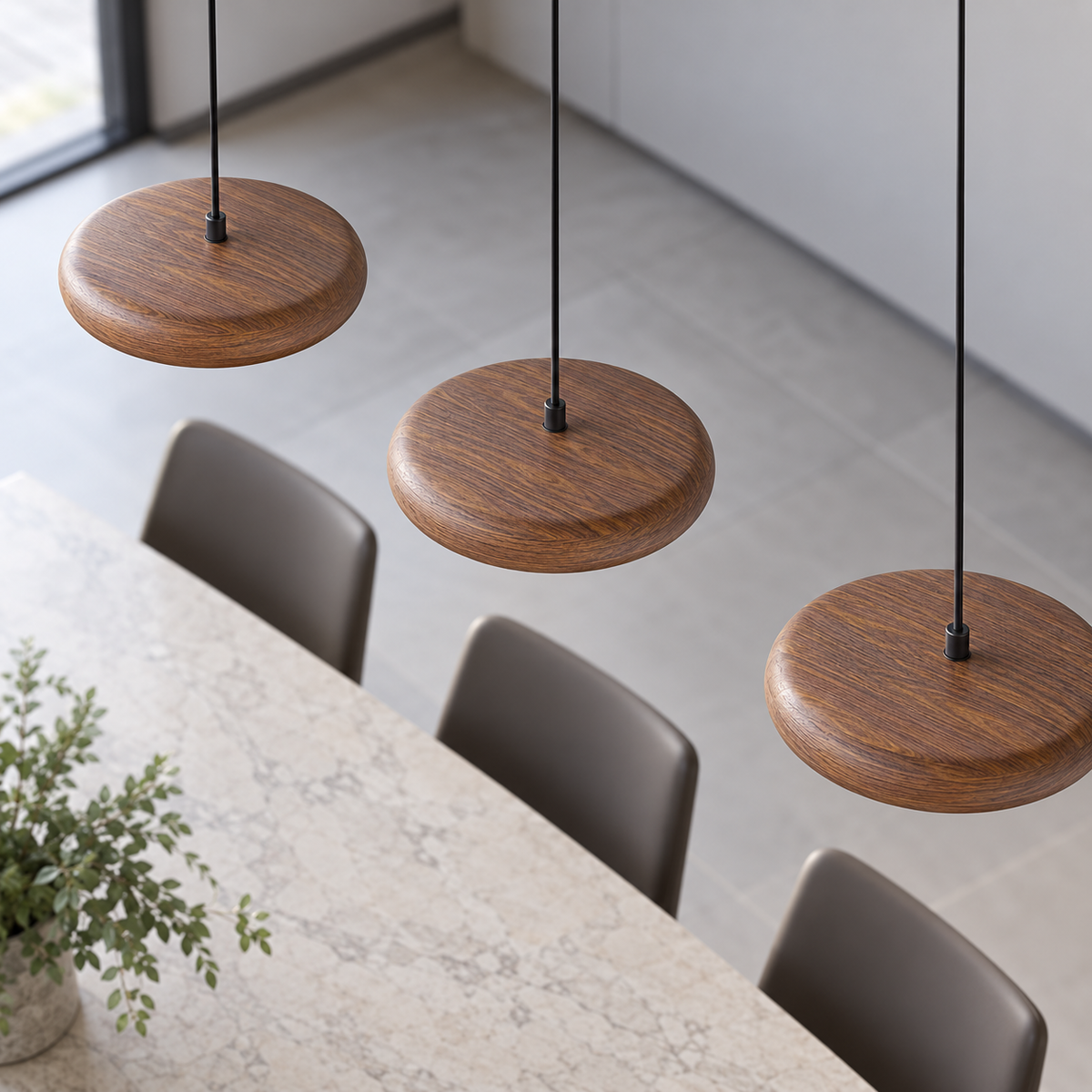 Three walnut-effect disc pendant heads viewed from above, showing their top surfaces and straight row arrangement