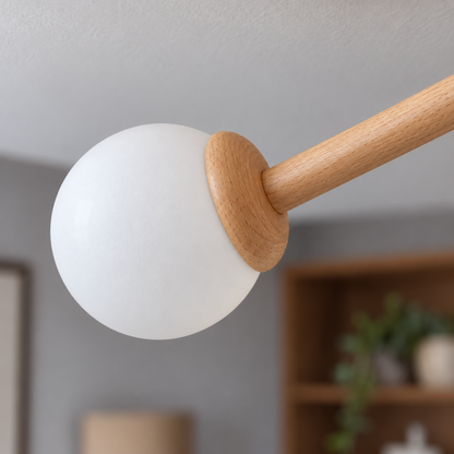 Branching wood ceiling light with frosted glass globes — detail close