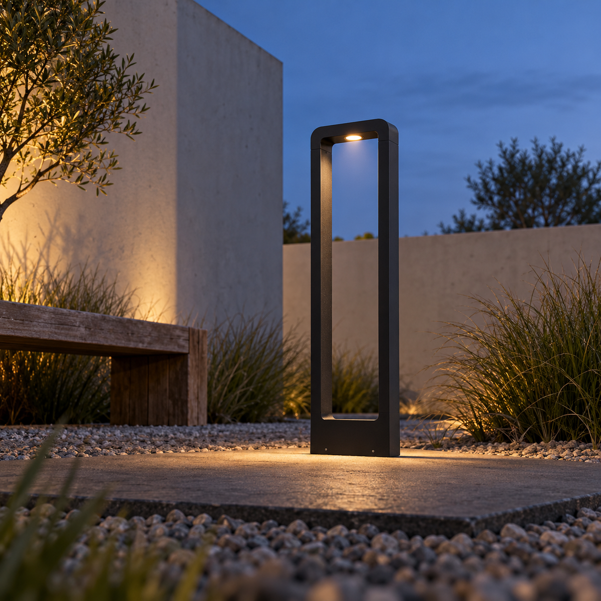 Low underside view of an installed black open frame garden bollard