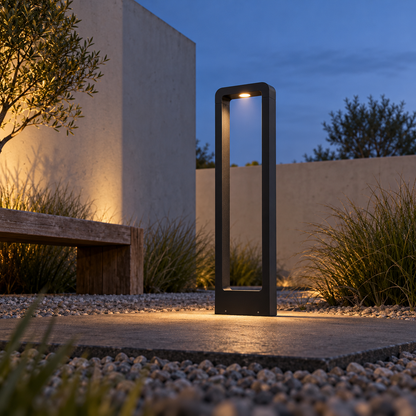 Low underside view of an installed black open frame garden bollard