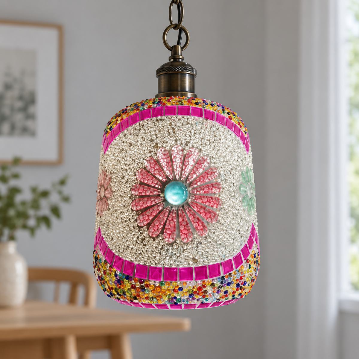 Daylight close-up of pink glass petals, clear beads and bronze pendant fitting