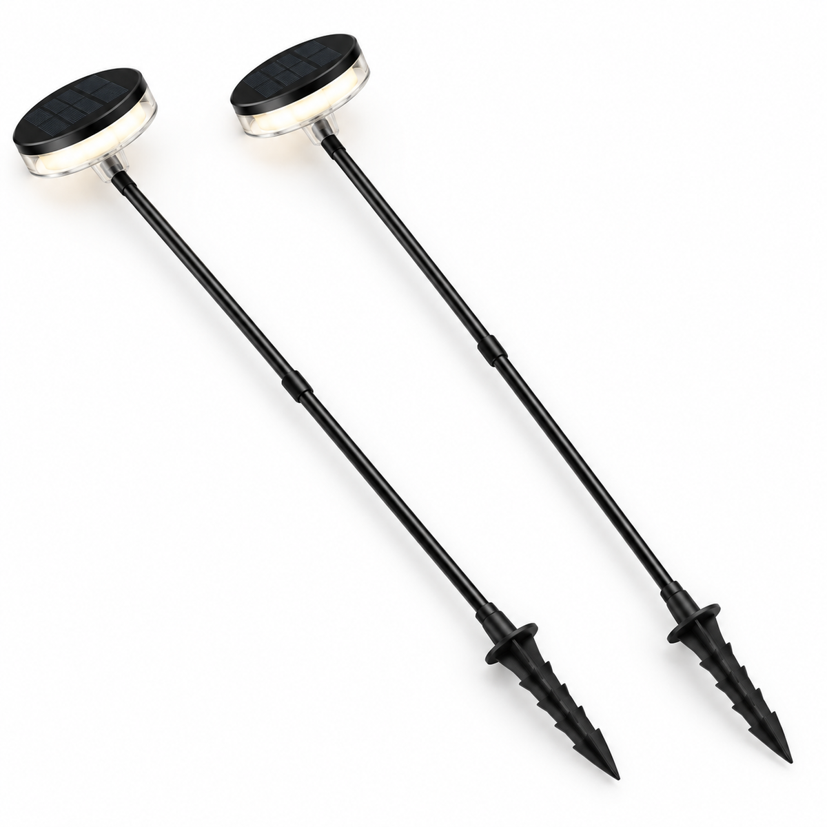 Pair of black solar disc garden lights with full stems and ground stakes on white