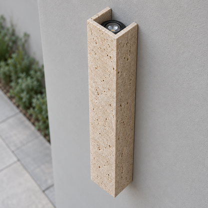 60 cm travertine wall light seen from above with its upper recessed COB optic