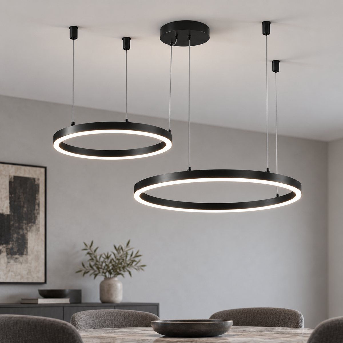 Black suspended LED chandelier with two offset horizontal rings, 40 and 60 cm, in a neutral dining room