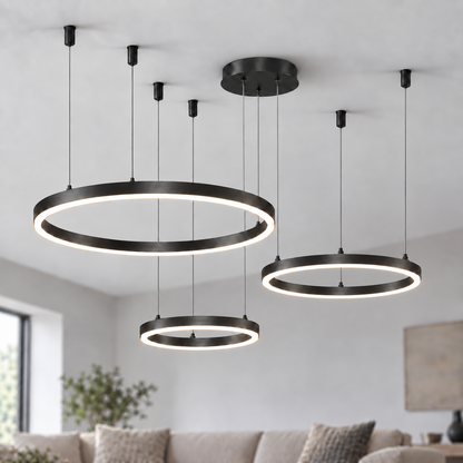 Black suspended LED chandelier with three horizontal rings in 30, 40 and 60 cm diameters.