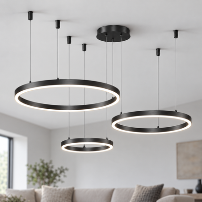 Black suspended LED chandelier with three horizontal rings in 40, 60 and 80 cm diameters.