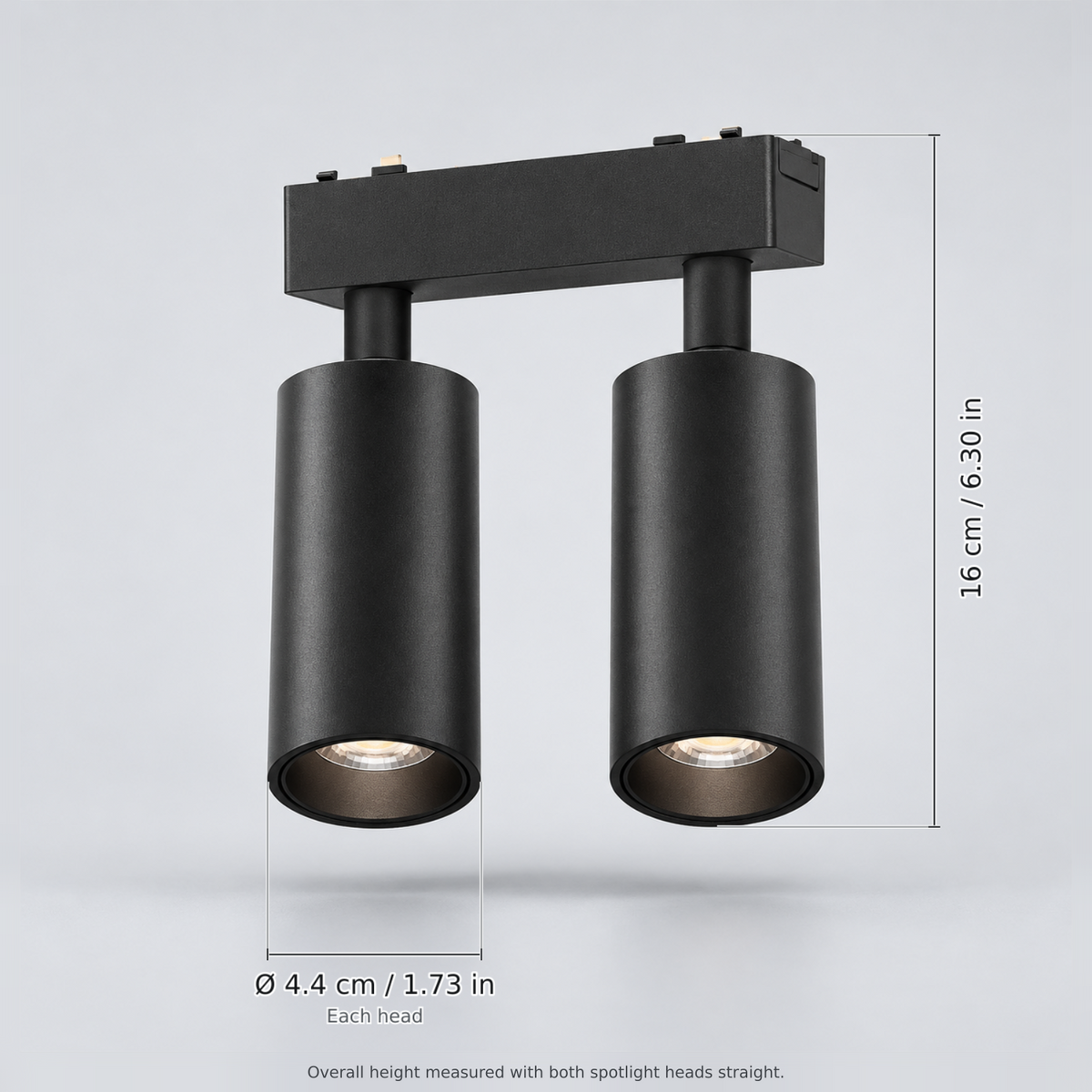Black double spotlight 18w with dimension lines in centimetres and inches: Overall height (heads straight) 16 cm / 6.30 in; Each head Ø 4.4 cm / 1.73 in.