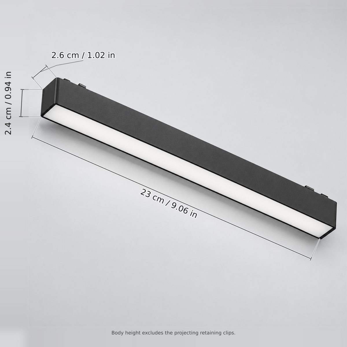 Black length 23 cm (floodlight 10w) with dimension lines in centimetres and inches: Length 23 cm / 9.06 in; Width 2.6 cm / 1.02 in; Body height 2.4 cm / 0.94 in.