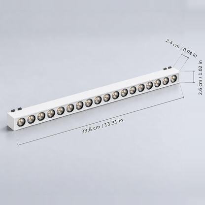 White grille light 18w with dimension lines in centimetres and inches: Body length 33.8 cm / 13.31 in; Body width 2.6 cm / 1.02 in; Body height excluding contacts 2.4 cm / 0.94 in.